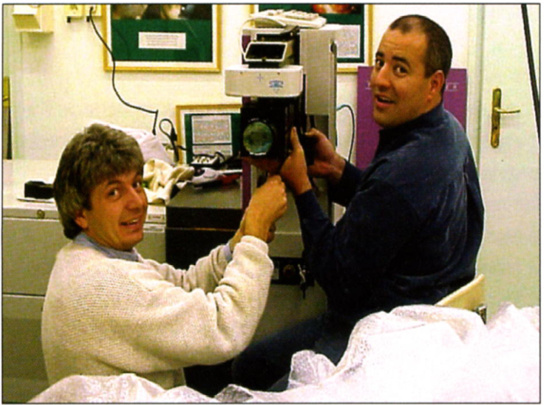 Tibor Juhász, PhD, and Christopher Horvath, PhD, installig the prototype laser at the first clinical site in 1998