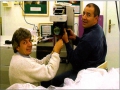 Tibor Juhász, PhD, and Christopher Horvath, PhD, installig the prototype laser at the first clinical site in 1998